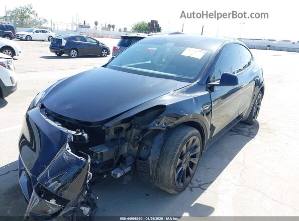 5YJYGDEE9MF073594 2021 TESLA MODEL Y Black Front view
