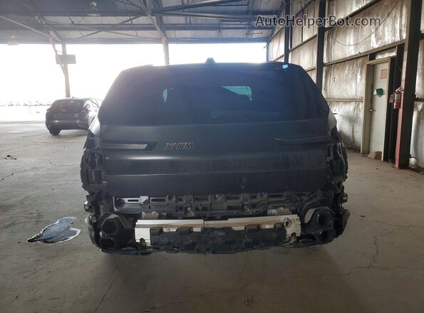5YM23CS00P9S24011 2023 BMW XM Black უკანა ხედი