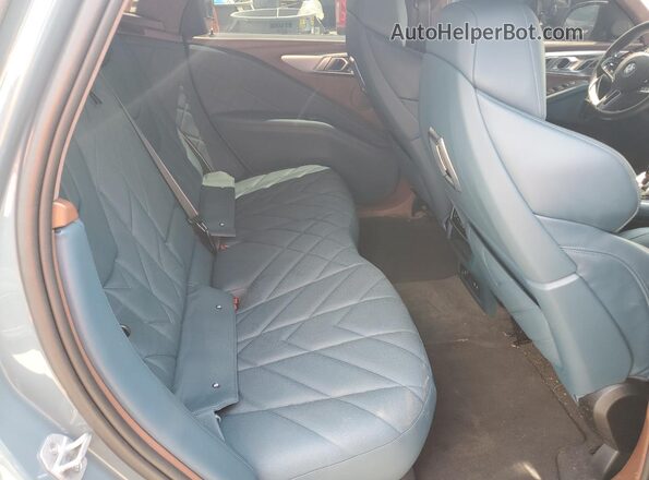 5YM23CS05P9S42634 2023 BMW XM Бирюзовый Вид задней части салона