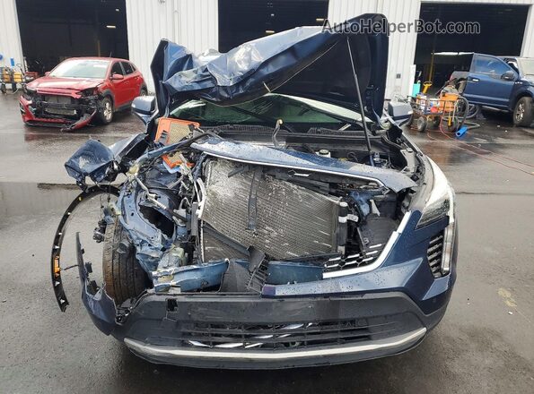 1GYFZCR43MF028086 2021 CADILLAC XT4 Blue Rear view