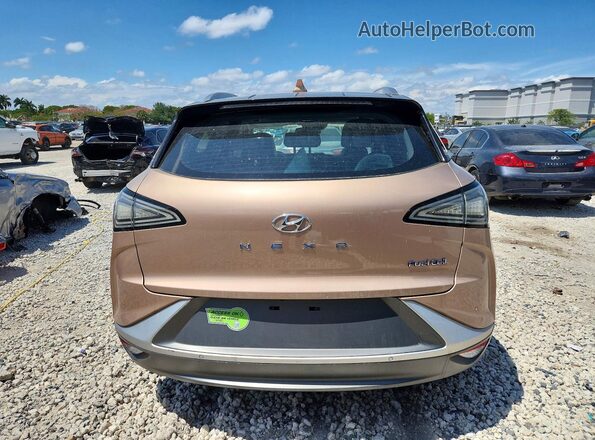 KM8J84A69LU007979 2020 HYUNDAI NEXO Gold Front interior view
