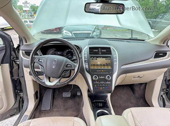 5LMCJ3D90HUL69989 2017 LINCOLN MKC Brown Vista de los asientos traseros