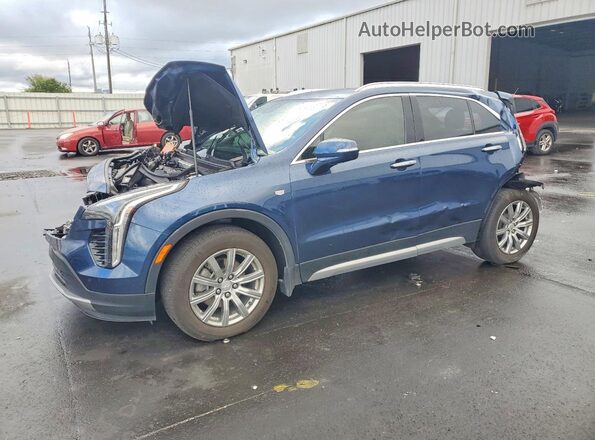 1GYFZCR43MF028086 2021 CADILLAC XT4 Blue Rear left