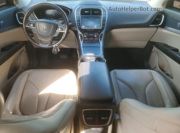 2LMPJ6K92KBL18911 2019 LINCOLN NAUTILUS Tan Սարքավորումների վահանակի տեսք