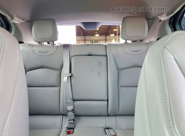 1GYFZCR43MF028086 2021 CADILLAC XT4 Blue Rear interior view