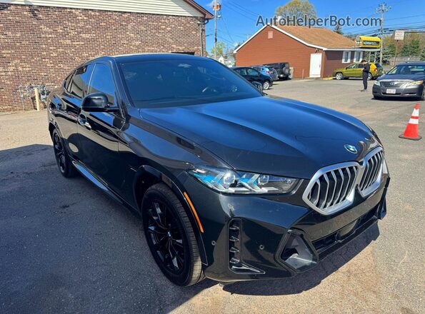 5UX33EX08R9T65489 2024 BMW X6 Black Front view