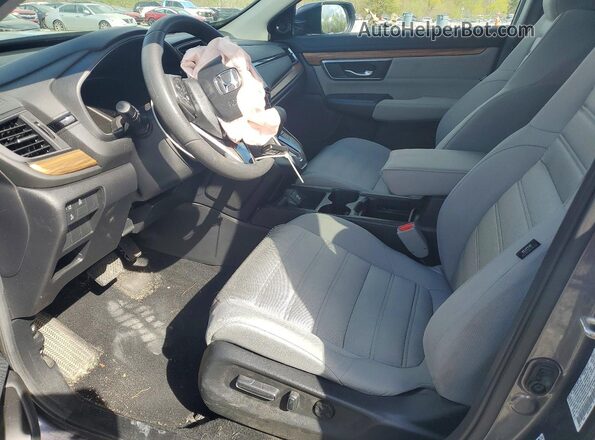 7FARW2H54JE012483 2018 HONDA CR-V Gray Front interior view