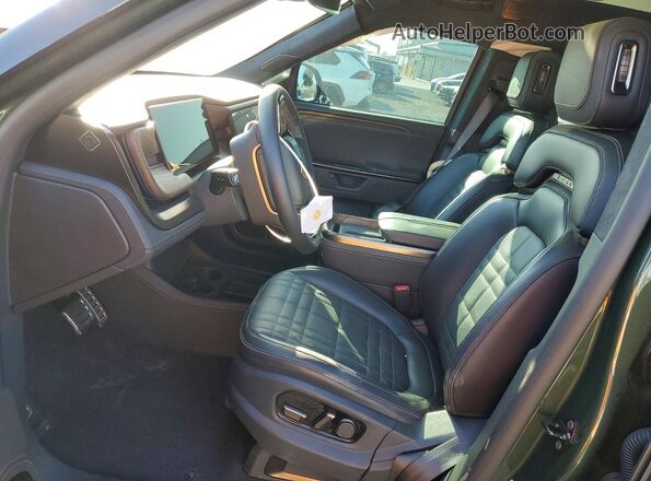 7FCTGCAP2SN038240 2025 RIVIAN R1T Зеленый Вид салона спереди