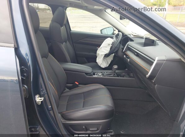 7MMVAADW7SN101727 2025 MAZDA CX-50 HYBRID Blue Front interior view