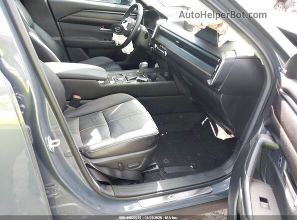 7MMVAAEW5SN115771 2025 MAZDA CX-50 HYBRID Gray წინა სალონის ხედი