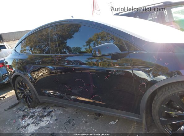 7SAXCBE67NF333967 2022 TESLA MODEL X Black Սալոնի հետևի տեսք