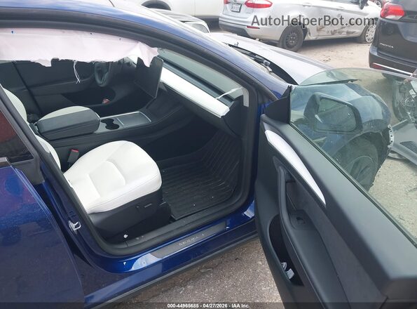 7SAYGAEE3RF159105 2024 TESLA MODEL Y Синий Вид салона спереди