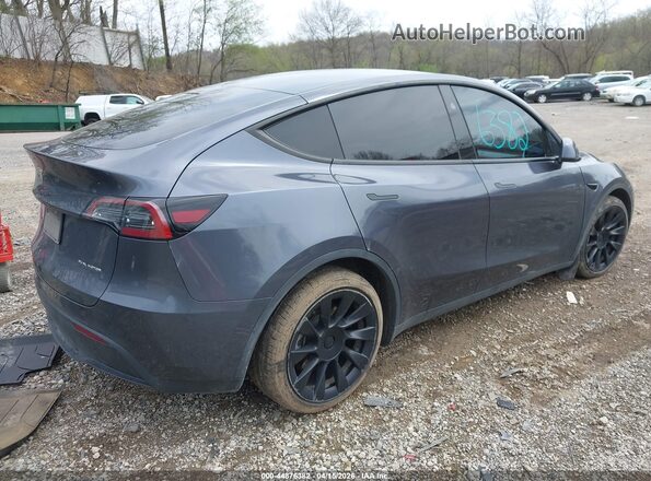 7SAYGAEE9PF964944 2023 TESLA MODEL Y Gray Trasero derecho