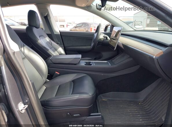 7SAYGAEEXNF366830 2022 TESLA MODEL Y Black Вид салону спереду