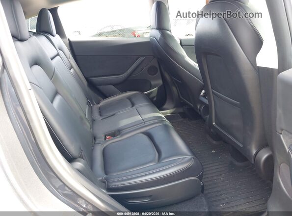 7SAYGAEEXNF366830 2022 TESLA MODEL Y Black Вид наклейки з VIN-кодом