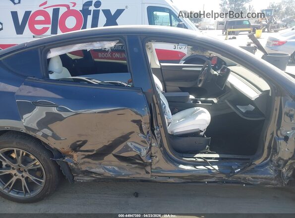 7SAYGDED0SF316099 2025 TESLA MODEL Y Black Սալոնի հետևի տեսք