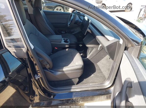 7SAYGDED0TA597772 2026 TESLA MODEL Y Черный Вид салона спереди