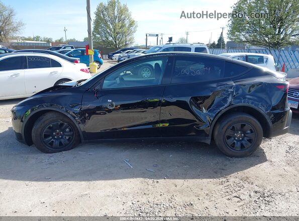 7SAYGDED0TA597772 2026 TESLA MODEL Y Черный Вид задней части салона