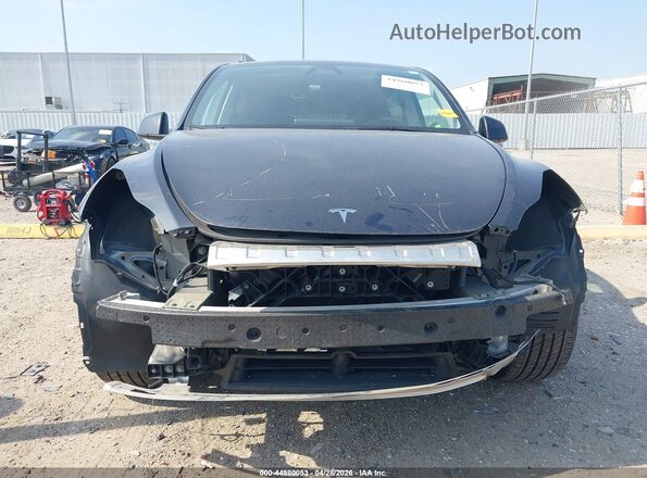 7SAYGDED1RF152274 2024 TESLA MODEL Y Black Սալոնի հետևի տեսք