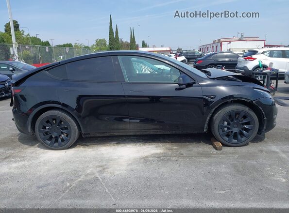 7SAYGDED2RF054631 2024 TESLA MODEL Y Black Սալոնի հետևի տեսք