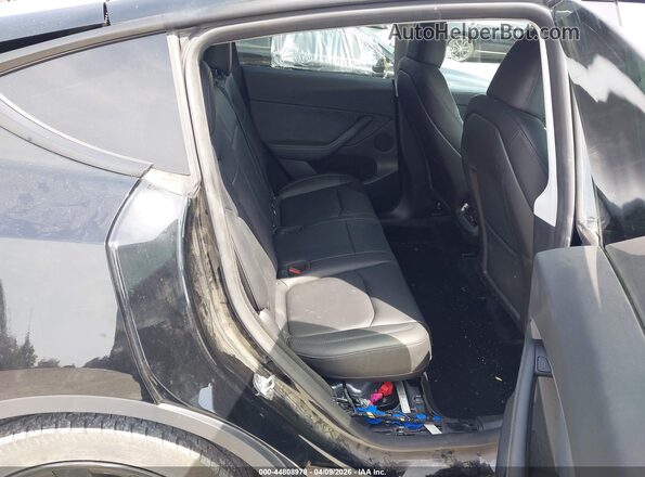 7SAYGDED2RF054631 2024 TESLA MODEL Y Black VIN կոդի պիտակի տեսք