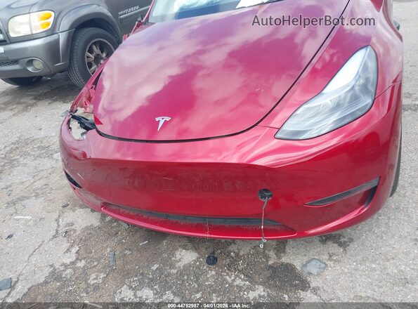 7SAYGDED3RF113881 2024 TESLA MODEL Y Красный Вид панели приборов