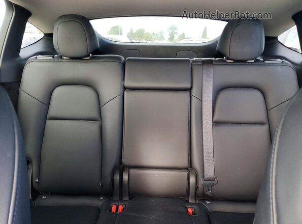 7SAYGDED5SF249158 2025 TESLA MODEL Y Gray Սալոնի հետևի տեսք