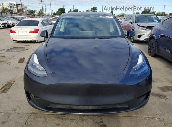 7SAYGDED5SF249158 2025 TESLA MODEL Y Gray Հետևի տեսք