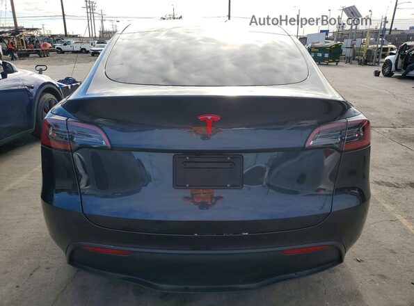 7SAYGDED5SF249158 2025 TESLA MODEL Y Gray Սալոնի դիմացի տեսք