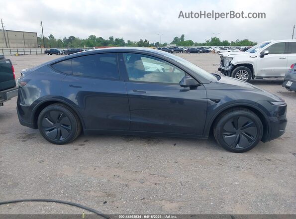 7SAYGDED6TA642231 2026 TESLA MODEL Y Blue Սալոնի հետևի տեսք