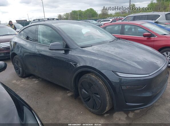7SAYGDED6TF383372 2026 TESLA MODEL Y Gray Widok wnętrza z tyłu