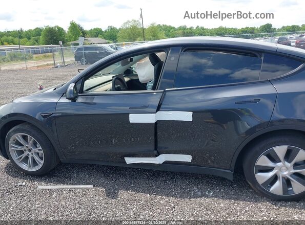 7SAYGDED8RF015297 2024 TESLA MODEL Y Серый Вид задней части салона