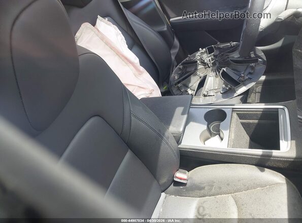 7SAYGDED8RF015297 2024 TESLA MODEL Y Серый Вид салона спереди