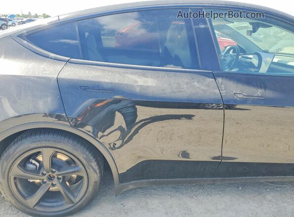 7SAYGDED8TA454679 2026 TESLA MODEL Черный Вид задней части салона