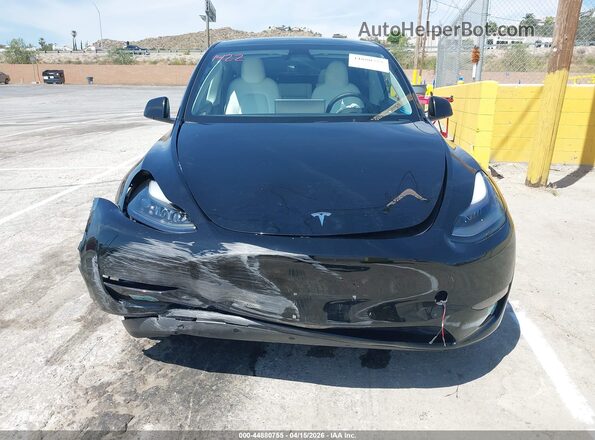 7SAYGDED9RF011422 2024 TESLA MODEL Y Черный Вид панели приборов
