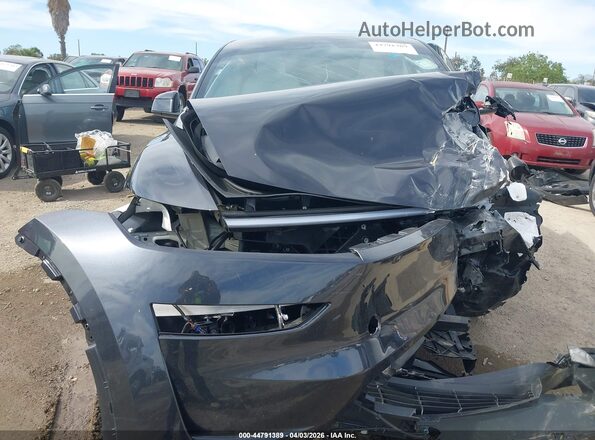 7SAYGDED9TF404182 2026 TESLA MODEL Y Gray Առջևի վահանակի տեսք