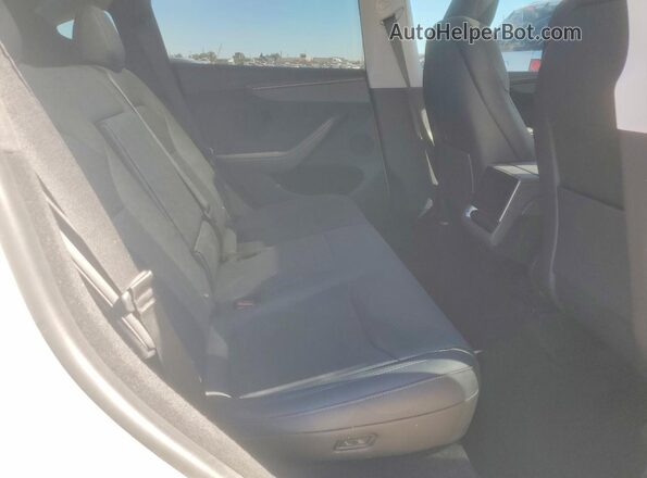 7SAYGDEDXTA500576 2026 TESLA MODEL White Rear seats view