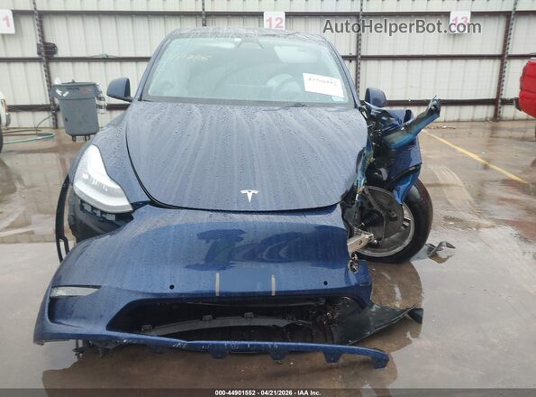 7SAYGDEE3NF384927 2022 TESLA MODEL Y Blue Vista interior trasera