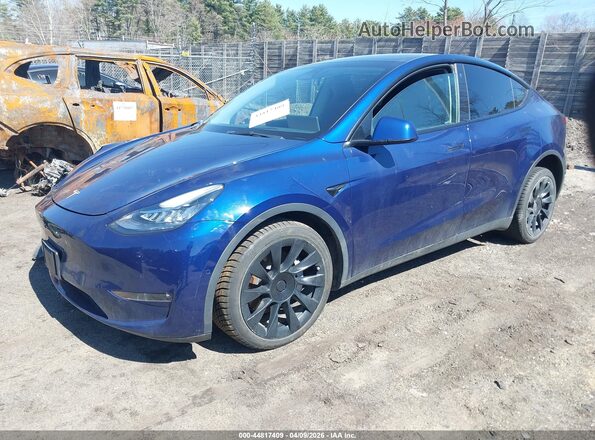 7SAYGDEE3NF481433 2022 TESLA MODEL Y Blue Առջևի ձախ երեք քառորդ տեսարան