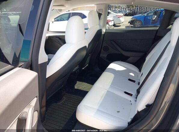 7SAYGDEE3PF828438 2023 TESLA MODEL Y Gray VIN sticker view
