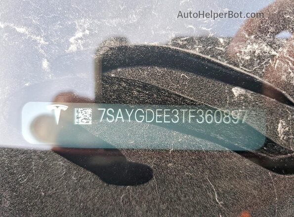 7SAYGDEE3TF360897 2026 TESLA MODEL Red VIN կոդի պիտակի տեսք