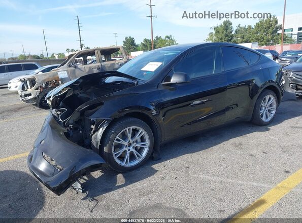 7SAYGDEE5PA154743 2023 TESLA MODEL Y Black Առջևի ձախ երեք քառորդ տեսարան