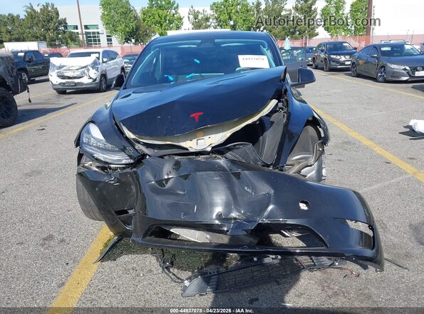 7SAYGDEE5PA154743 2023 TESLA MODEL Y Black Դիմացի տեսք