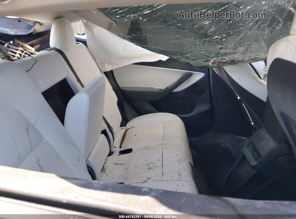 7SAYGDEE6NF395310 2022 TESLA MODEL Y Blue Հետևի նստատեղերի տեսք