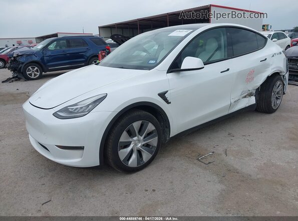 7SAYGDEE6PA094956 2023 TESLA MODEL Y White Vista tres cuartos delantera izquierda