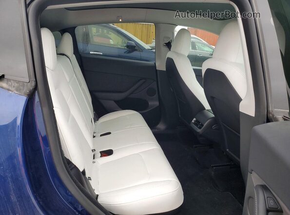 7SAYGDEE6SF257911 2025 TESLA MODEL Blue Вид задньої частини салону