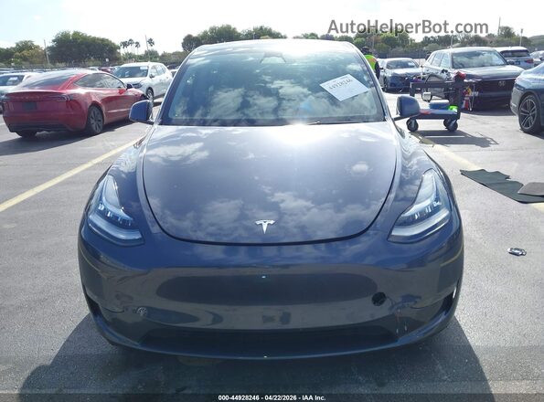 7SAYGDEE7PA110646 2023 TESLA MODEL Y Серый Вид панели приборов