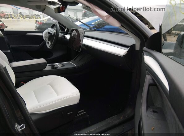 7SAYGDEE7PA194192 2023 TESLA MODEL Y Gray Вид салону спереду