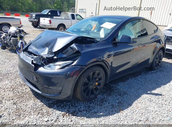 7SAYGDEE7RA252823 2024 TESLA MODEL Y Blue Առջևի ձախ երեք քառորդ տեսարան