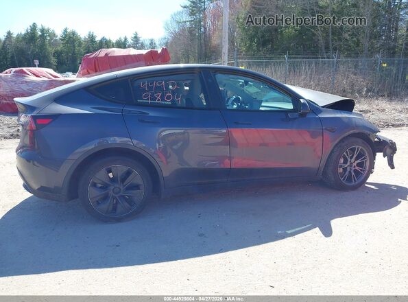 7SAYGDEE7RA299673 2024 TESLA MODEL Y Gray Սալոնի հետևի տեսք